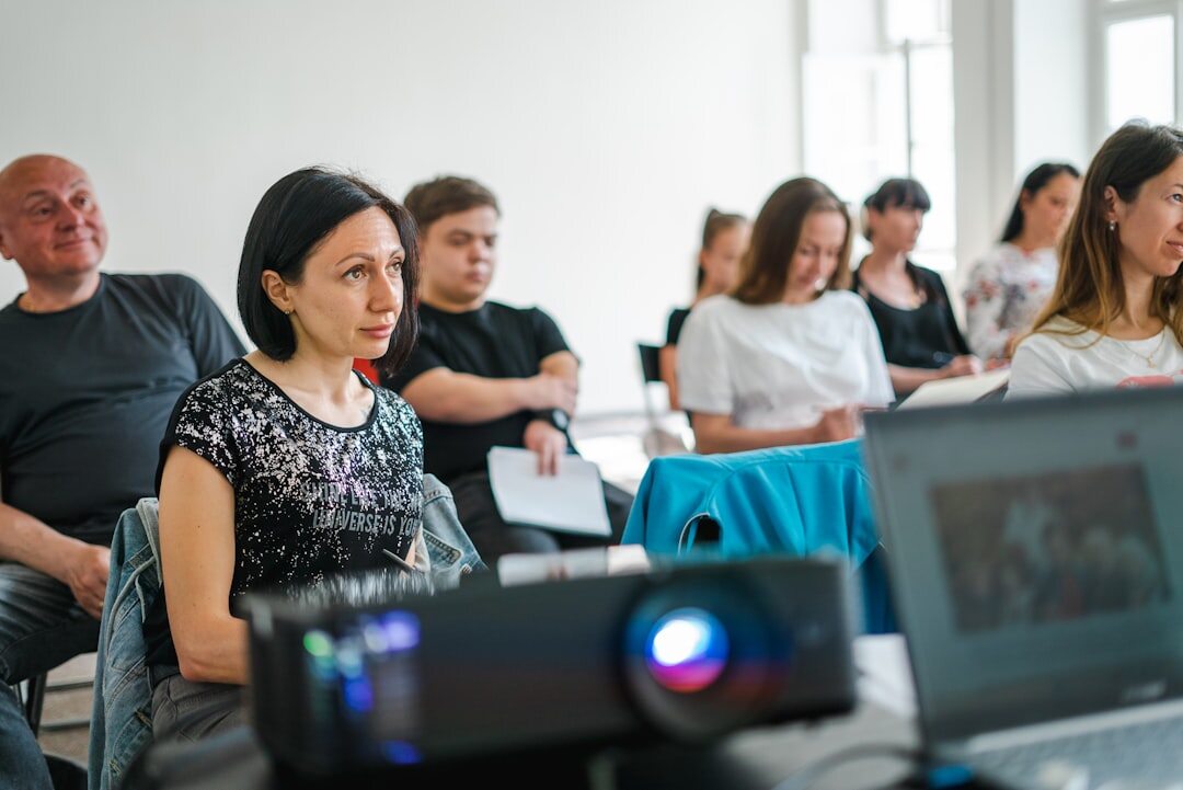Workshop participants listening to a speaker