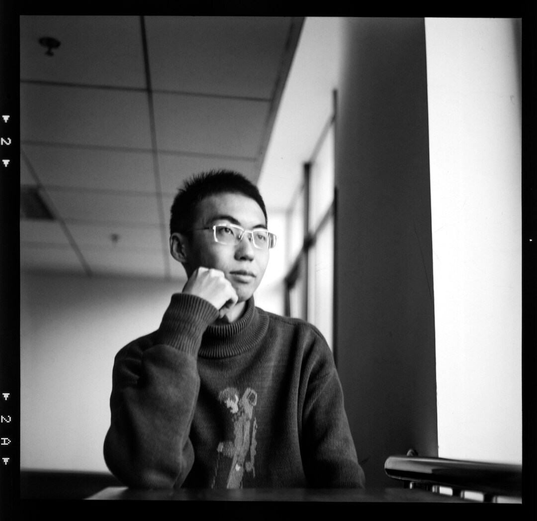 Professional portrait of a male programmer and educator