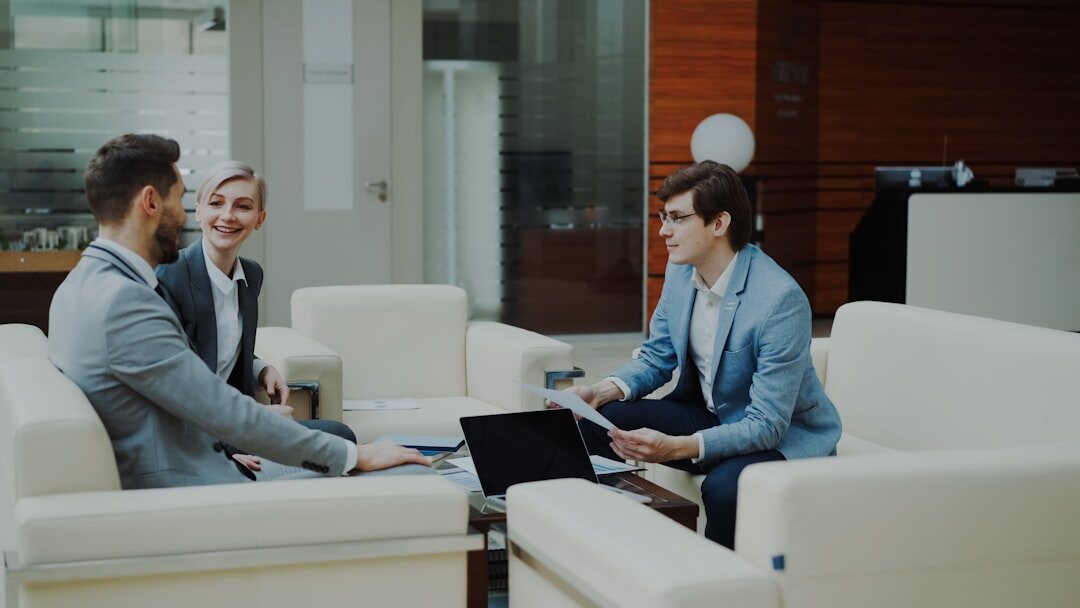 Two professionals conducting an interview in a modern office